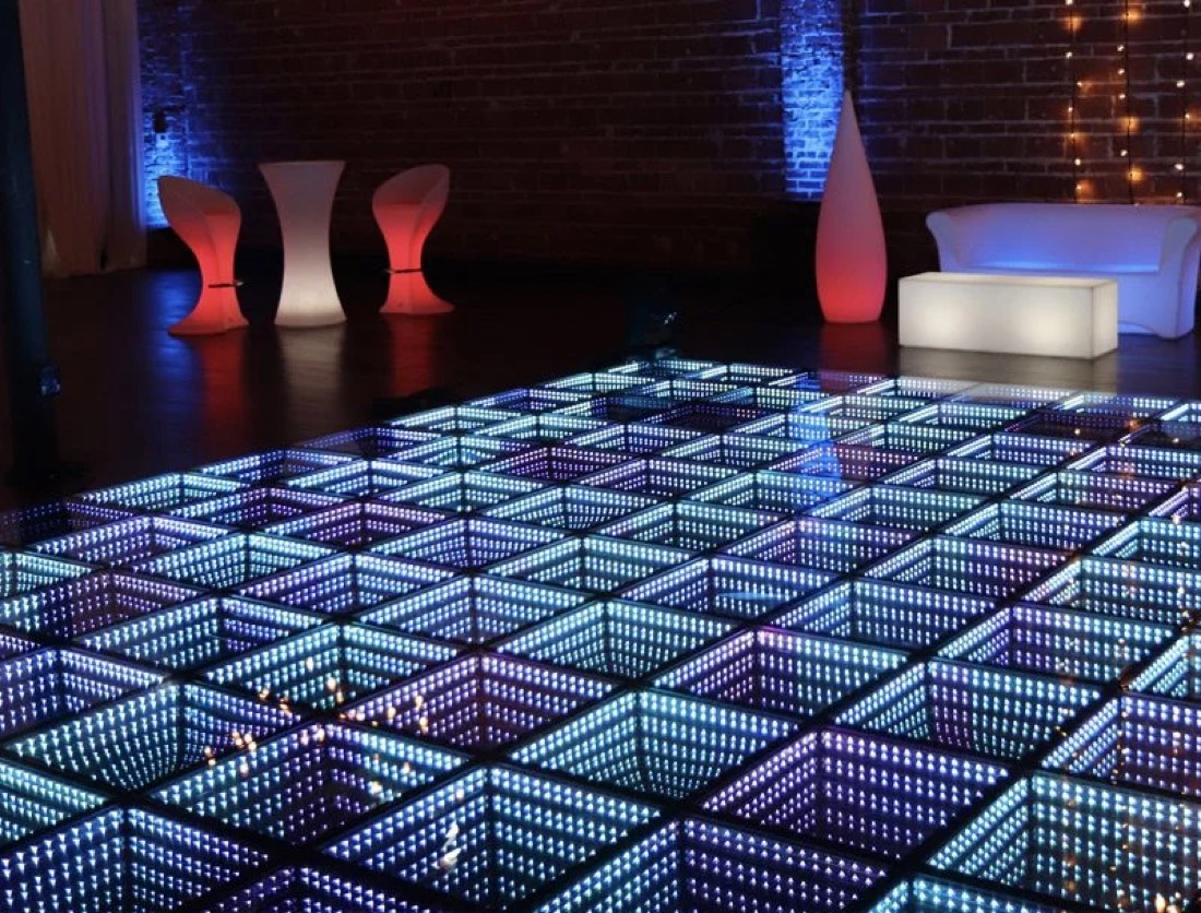 Blue infinity LED dance floor with glowing LED lounge furniture